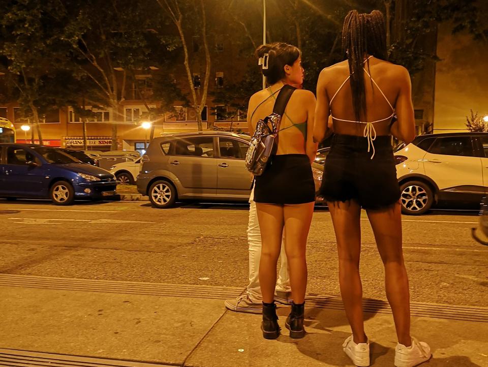 Two of many people struggling to hail a taxi on the way home from Primavera Sound.