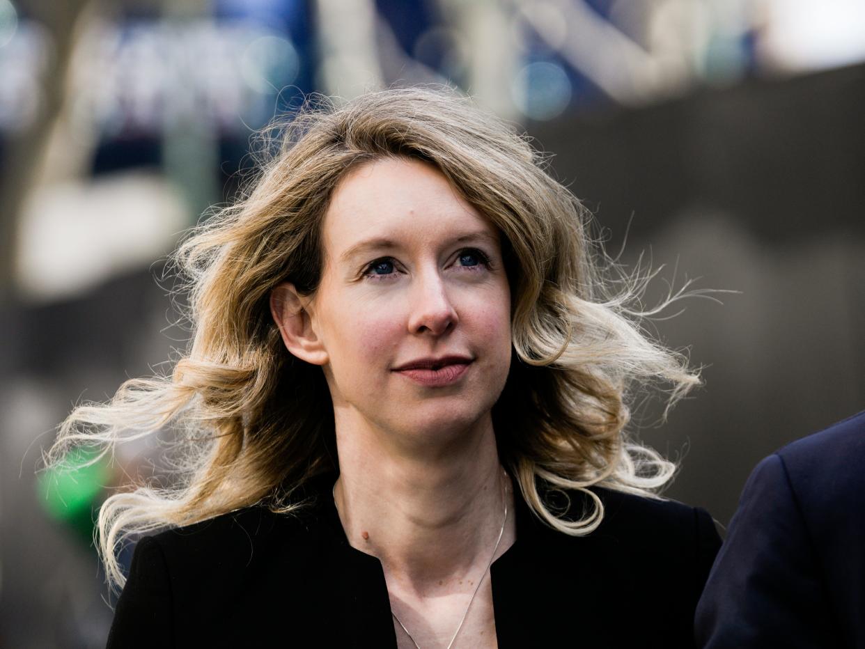 Former Theranos CEO Elizabeth Holmes alongside her boyfriend Billy Evans, walks back to her hotel following a hearing at the Robert E. Peckham U.S. Courthouse on March 17, 2023 in San Jose, California.