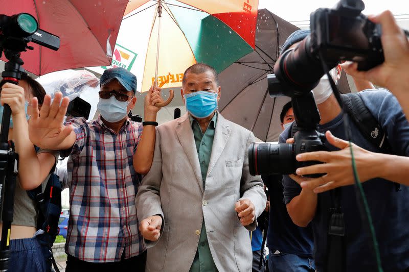 Media mogul Jimmy Lai Chee-ying, founder of Apple Daily, arrives at West Kowloon Magistrates' Courts, in Hong Kong