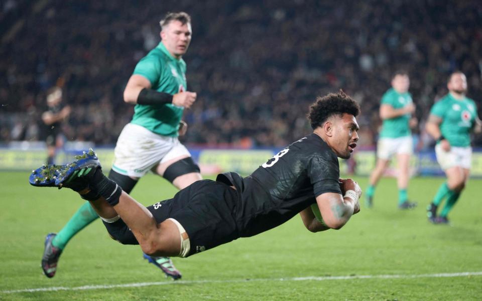 New Zealands Ardie Savea dives in for a try during the rugby test match between the New Zealand All Blacks and Ireland at Eden Park in Auckland on July 2, 2022. - GETTY IMAGES