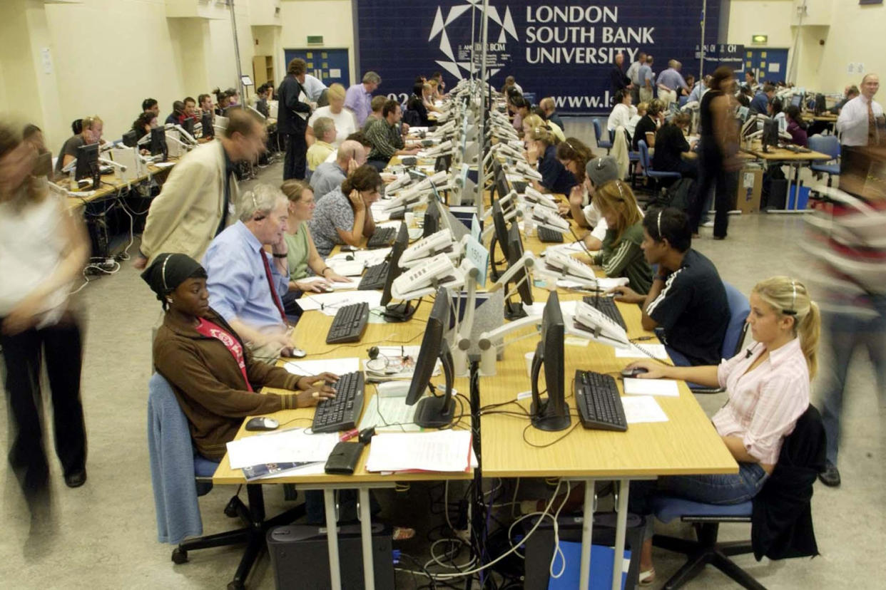 Workers take calls at the clearing centre at London's South Bank University: Myung Jung Kim/PA