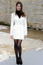 <b>Couture Fashion Week:</b> Laetitia Casta bucked the trend for all-black with a white jacket ©Rex