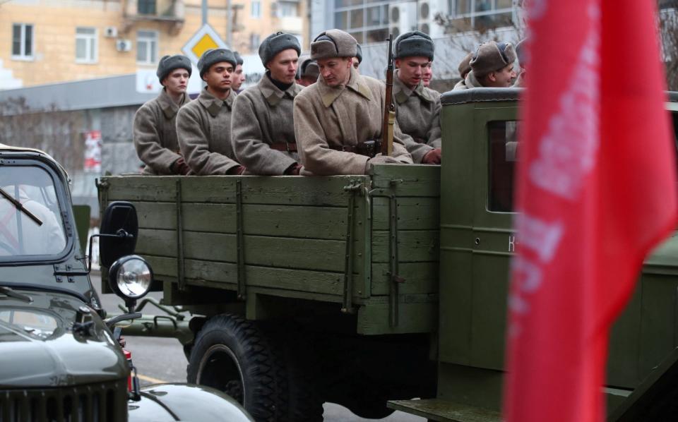 A military parade in the city with World War Two-era vehicles and participants dressed in period uniform - Kirill Braga/Reuters