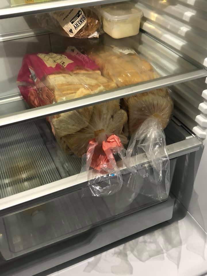 Loaves of bread in the fridge at a Perth man's workplace which sparked debate over whether they should kept in the freezer.
