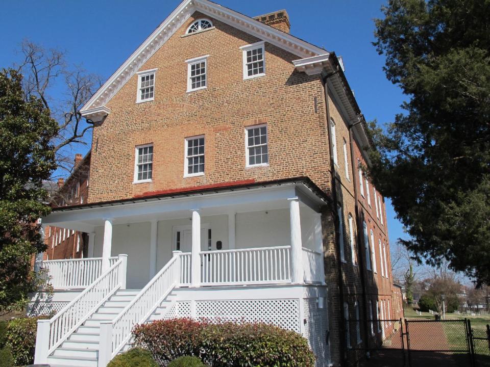 This March 24, 2014 photo shows the home of Charles Carroll, the only Catholic signer of the Declaration of Independence, in Annapolis, Md. The home is open for free public tours for individuals and groups of up to six people on weekends from June through October. The home also has one of the most intact 18th century garden designs in the Chesapeake region. (AP Photo/Brian Witte)