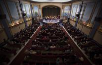 Local residents perform and watch a vaudeville show in celebration of the theatre's 100th anniversaruy. (Reuters)