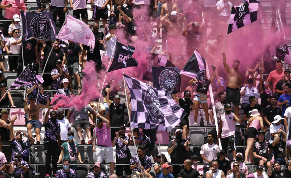 Inter Miami fans cheer on their team against Atlanta United during the first half of an MLS soccer match, Sunday, May 9, 2021, in Fort Lauderdale, Fla. (AP Photo/Jim Rassol)