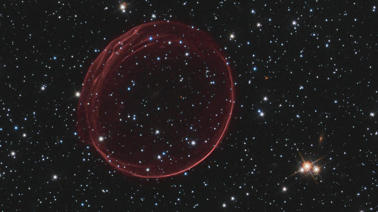  A delicate sphere of gas created by a supernova blast wave 160,000 light-years from Earth. 