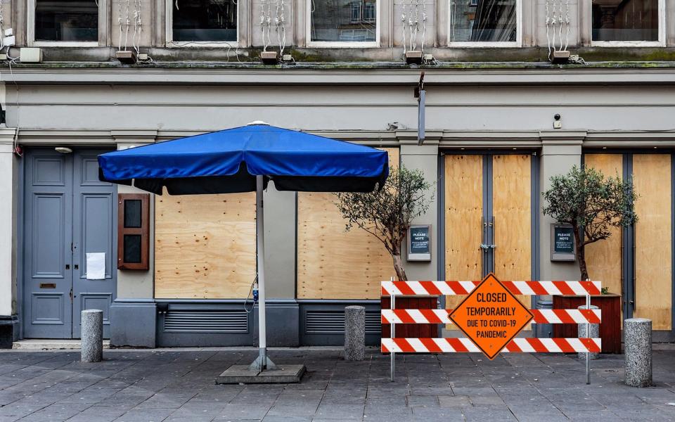 Boarded up restaurant