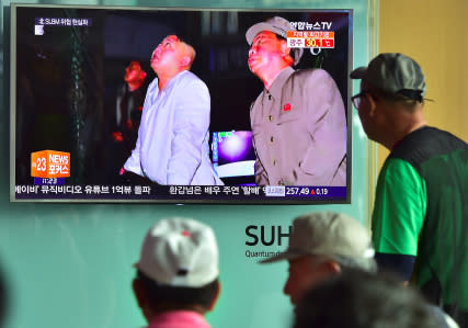 People watch a television screen reporting news of North Korea's latest submarine-launched ballistic missile test at a railway station in Seoul on August 25, 2016. North Korean leader Kim Jong-Un declared a recent submarine-launched ballistic missile (SLBM) test the "greatest success", Pyongyang's state media said on August 25. / AFP / JUNG YEON-JE (Photo credit should read JUNG YEON-JE/AFP/Getty Images)