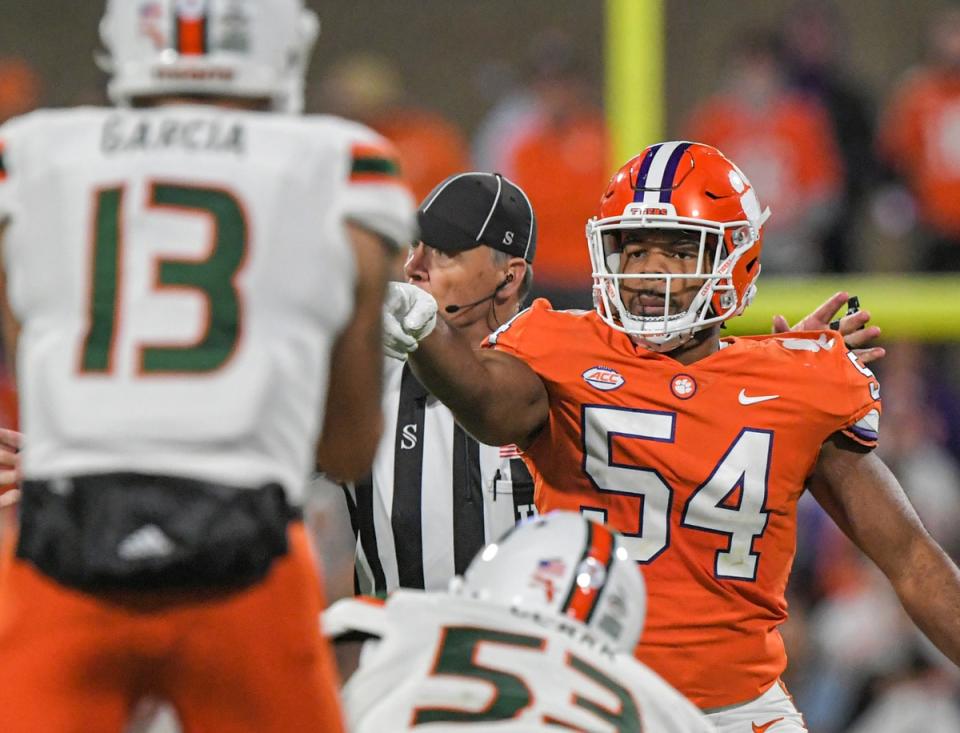 Nov 19, 2022; Clemson, South Carolina, USA; Clemson Tigers linebacker Jeremiah Trotter Jr. (54) points to the Miami Hurricanes offense during the fourth quarter at Memorial Stadium. Mandatory Credit: Ken Ruinard-USA TODAY Sports