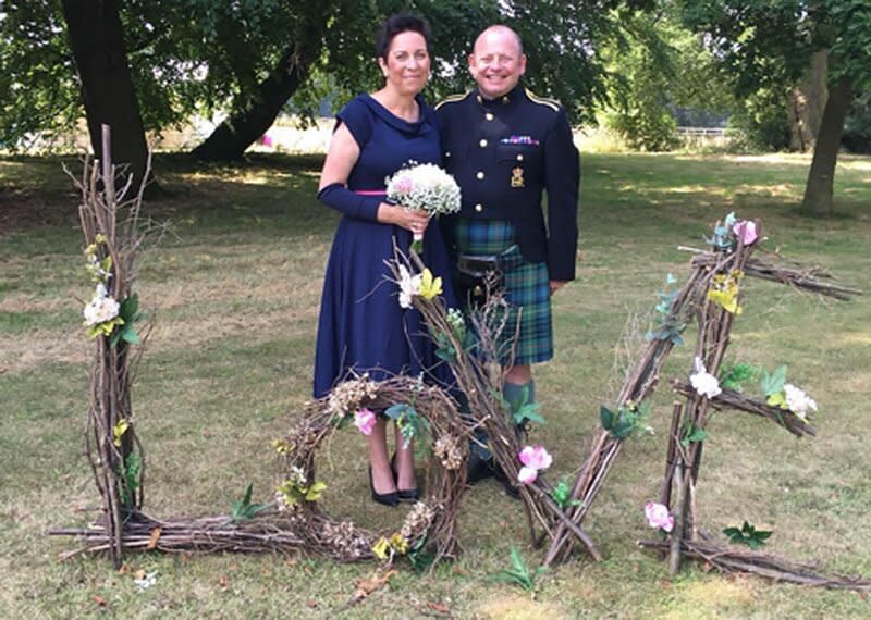 royal piper Scott Methven and his family (wife Morven, daughter Lilly-Grace, and son Fearghas)