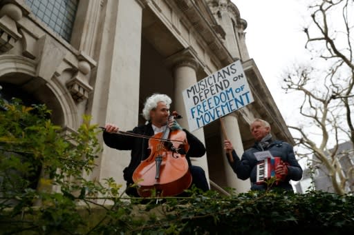 The family of British-German musician Simon Wallfisch, seen on the cello during a London performance to protest Brexit, were persecuted by the Nazis, but along with hundreds of others he is taking a German passport "to shore up some security for my future"