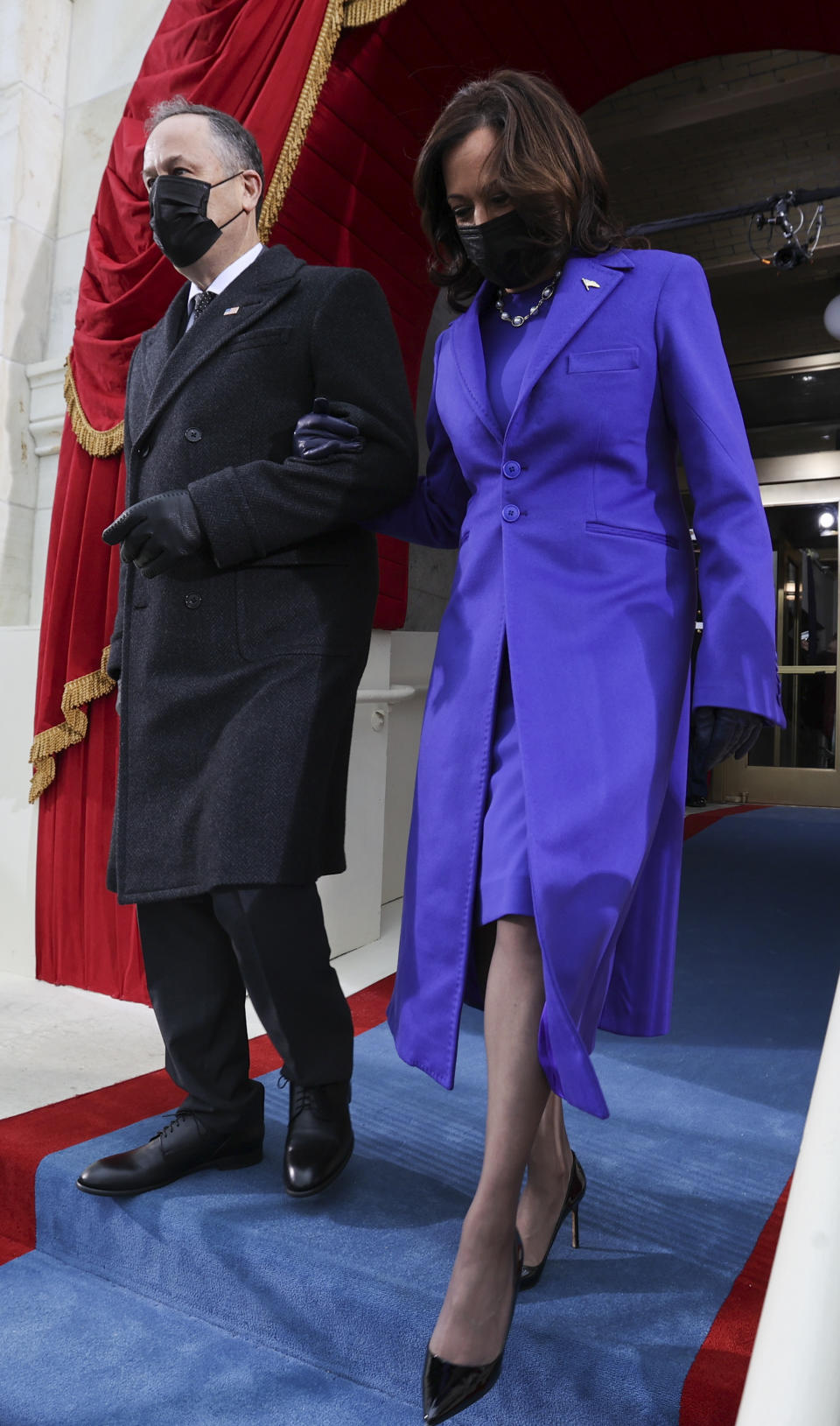 US Vice President-elect Kamala Harris and her spouse Doug Emhoff arrive for the inauguration. (Photo: Jonathan Ernst/APF via Getty Images)