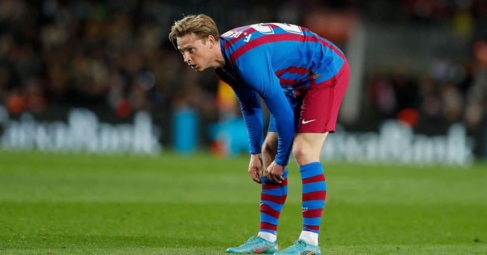 Man Utd target Frenkie de Jong pulls his socks up Credit: PA Images
