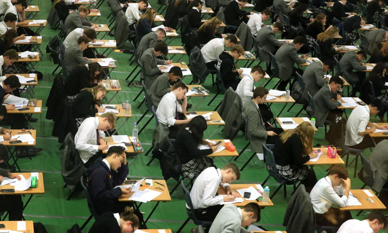 <span>Pupils sit an average of 30 hours of GCSE exams in their last summer at secondary school.</span><span>Photograph: Gareth Fuller/PA</span>