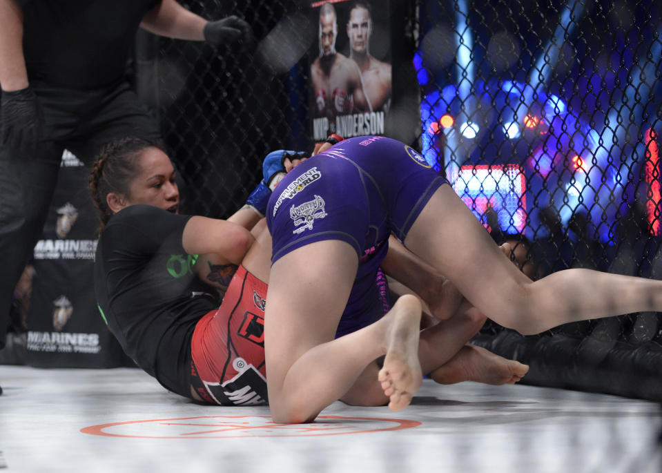 Women’s flyweight champion Ilima-Lei Macfarlane (L) will headline Bellator’s first show in Hawaii on Dec. 15 when she defends her title against Valerie Letourneau. (Getty Images)