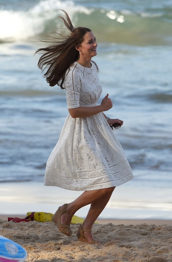 Catherine, the Duchess of Cambridge, runs along the beach at Manly, on Sydney's north shore on April 18, 2014. Britain's Prince William, his wife Kate and their son Prince George are on a three-week tour of New Zealand and Australia.    AFP PHOTO/William WEST        (Photo credit should read WILLIAM WEST/AFP/Getty Images)