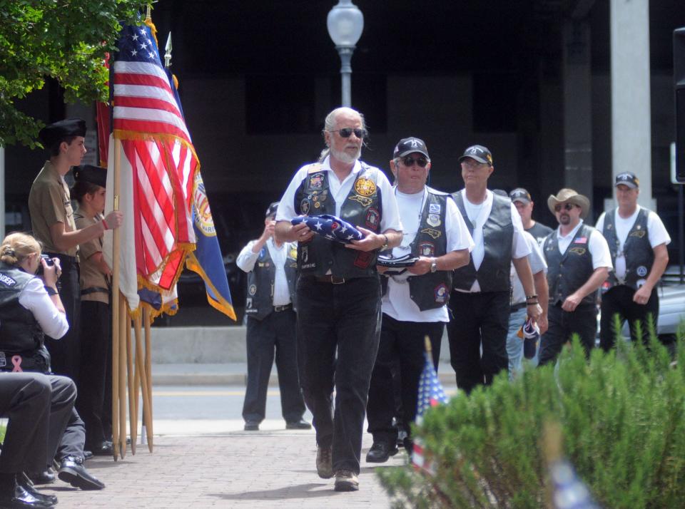 Members of Rolling Thunder take part in the change of flags during the National Maritime Day ceremony in downtown Wilmington in 2015.