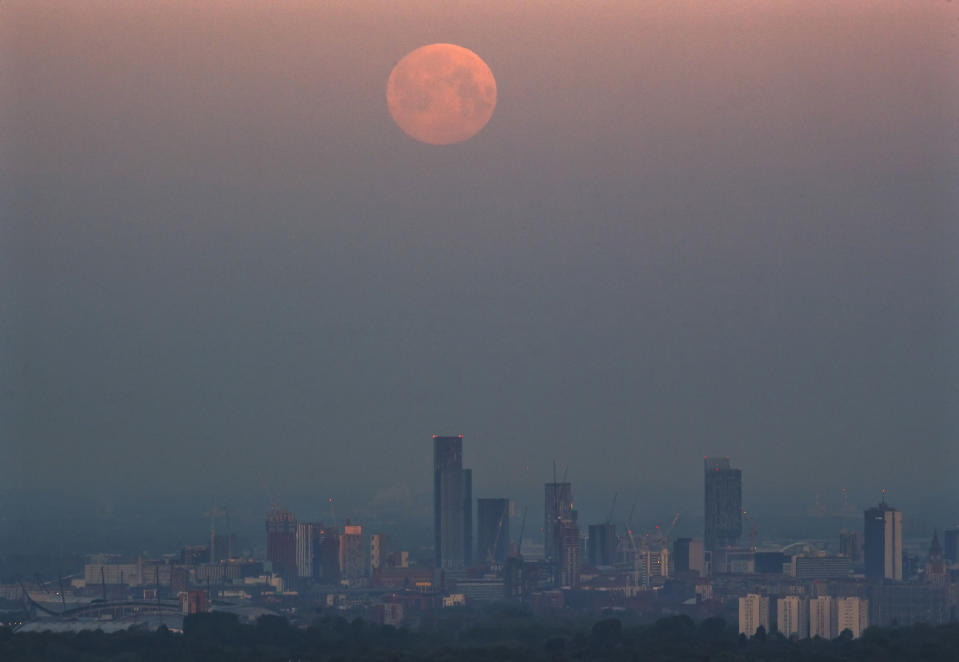 The full moon, known in May as the Flower Moon, above Manchester city centre.