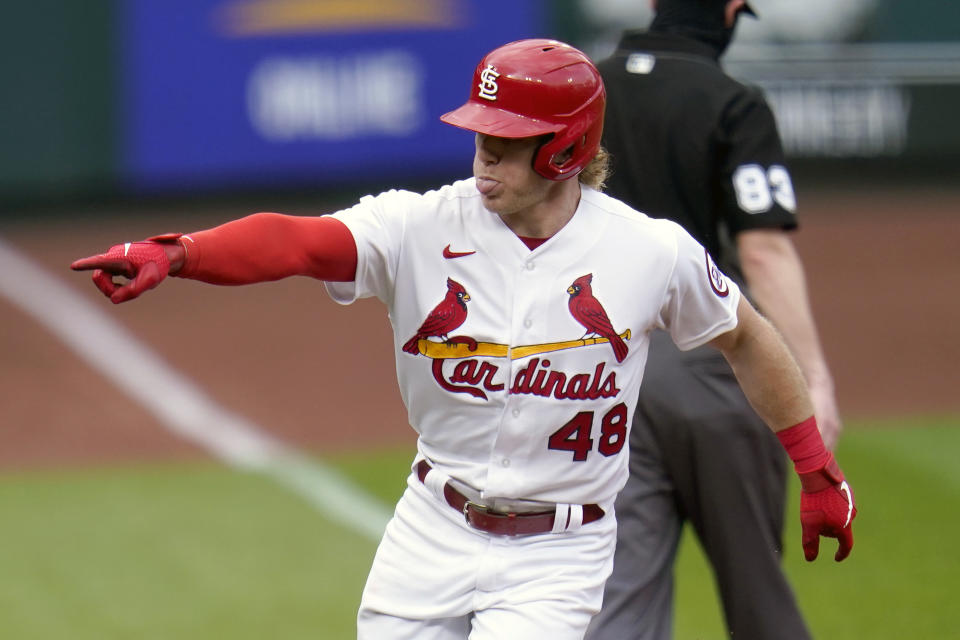 St. Louis Cardinals' Harrison Bader celebrates as he rounds the bases after hitting a solo home run during the fourth inning of a baseball game against the Milwaukee Brewers Sunday, Sept. 27, 2020, in St. Louis. (AP Photo/Jeff Roberson)