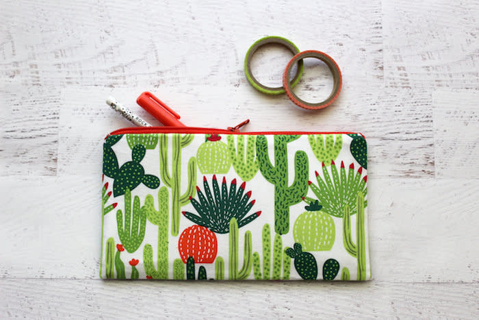 $12, Simbiosis By Julia. <a href="https://www.etsy.com/listing/512662078/cactus-pencil-pouch-cactus-zipper-pouch" target="_blank">Buy here.</a>