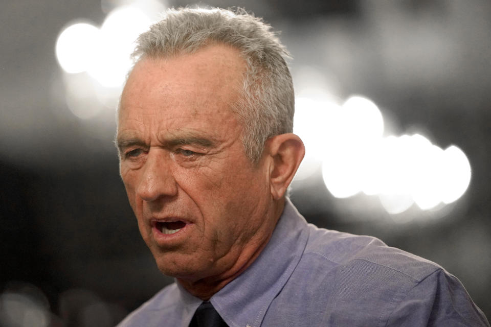 Independent presidential candidate Robert F. Kennedy Jr. interacts with voters at a voter rally, Wednesday, Dec. 20, 2023, in Phoenix. (AP Photo/Matt York)