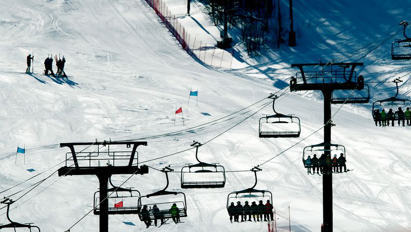 Skiers and Snowboarders ride lifts up the mountain at Park City Mountain Resort on Tuesday, Jan. 11, 2022. 