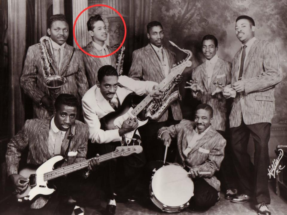 A black and white portrait of Kings of Rhythm with a red circle drawn around Raymond Hill.