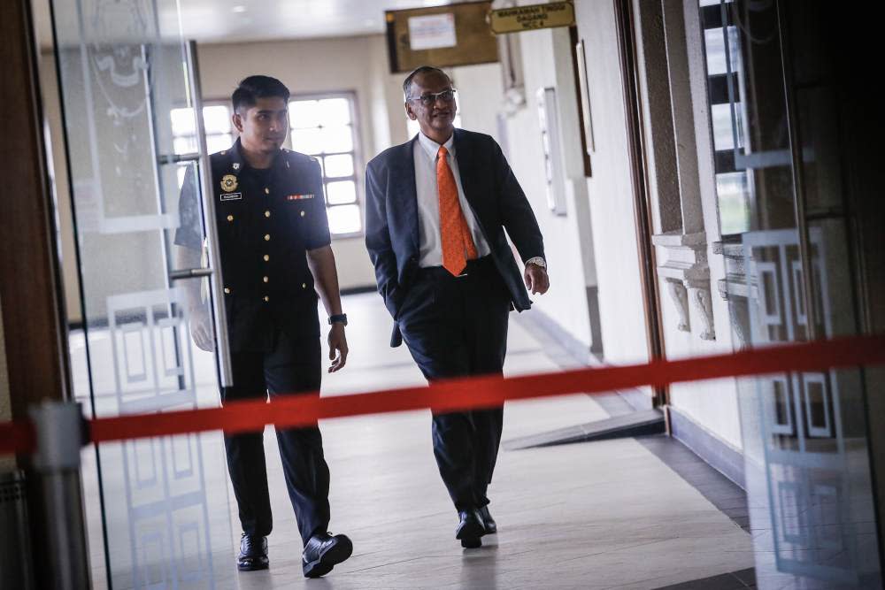 Former Auditor-General Tan Sri Ambrin Buang is seen at the Kuala Lumpur Court Complex, November 27, 2019. ― Picture by Hari Anggara