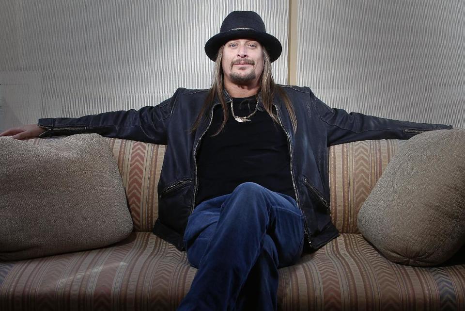 FILE - This Nov. 14, 2012 file photo shows Grammy-award winning artist Kid Rock posing for a portrait in New York. Kid Rock's “$20 Best Night Never Tour” kicks off June 28 in Bristow, Va., and opening acts include ZZ Top, Uncle Kracker and Kool and the Gang. (Photo by Carlo Allegri/Invision/AP, file)