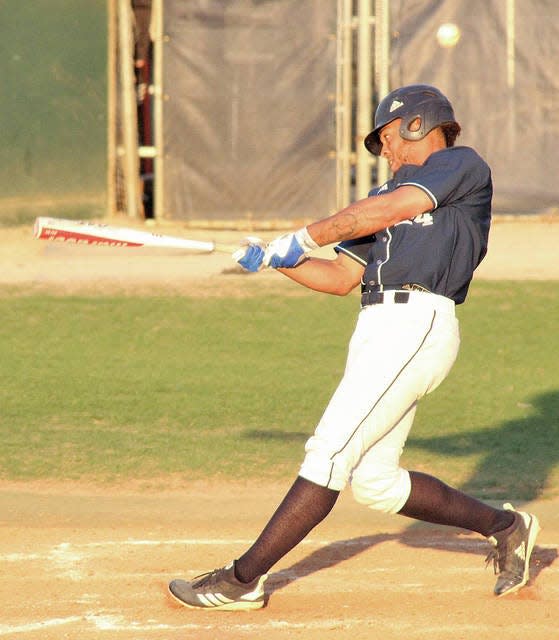 Drenis Ozuna fouls off a pitch during Oklahoma Wesleyan University's 2019 season. He earned NAIA First-Team All American honors. Ozuna is back with the Eagles in 2023, even though he missed the 2020-22 campaigns.  Mike Tupa/Examiner-Enterprise