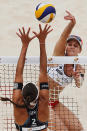 BEIJING, CHINA - MAY 09: April Ross (R) of the United States in action during a 2012 Swatch FIVB World Tour Beijing Grand Slam preliminary match in Chaoyang Park on May 9, 2012 in Beijing, China. (Photo by Lintao Zhang/Getty Images)