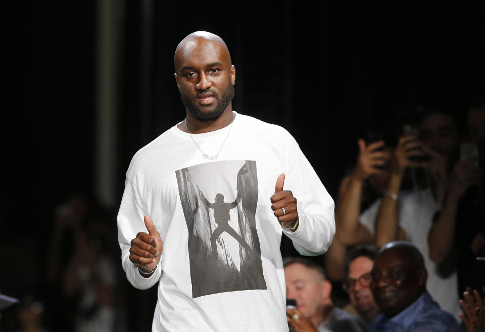 FILE -Fashion designer Virgil Abloh gives a thumbs up after the presentation of Off-White Men's Spring-Summer 2019 collection presented in Paris, Wednesday June 20, 2018. Abloh, a leading fashion executive hailed as the Karl Lagerfeld of his generation, has died after a private battle with cancer. He was 41. Abloh’s death was announced Sunday, Nov. 28, 2021 by LVMH Louis Vuitton and the Off White label, the brand he founded. (AP Photo/Thibault Camus, File)