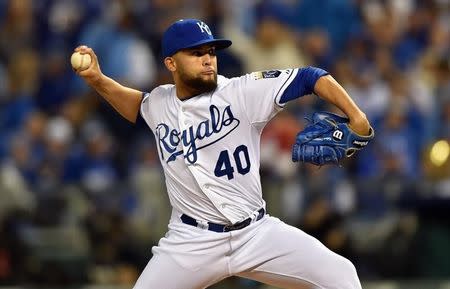 Oct 29, 2014; Kansas City, MO, USA; Kansas City Royals relief pitcher Kelvin Herrera throws a pitch against the San Francisco Giants in the fifth inning during game seven of the 2014 World Series at Kauffman Stadium. Mandatory Credit: Peter G. Aiken-USA TODAY Sports