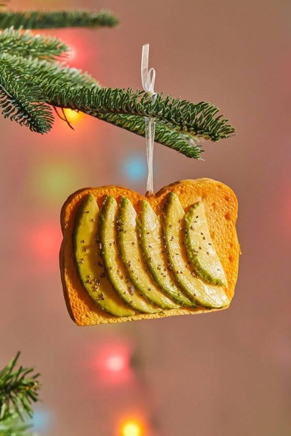 <p>You can’t make it through your daily IG feed without seeing at least one avocado toast photo. So why not add a touch of your #favorite food to your Christmas tree?</p> <p><strong>Shop Now:</strong> Avocado on Toast Christmas Ornament, $10, <a rel="nofollow noopener" href="https://www.urbanoutfitters.com/shop/avocado-toast-christmas-ornament?category=holiday-decorations&color=038" target="_blank" data-ylk="slk:urbanoutfitters.com;elm:context_link;itc:0;sec:content-canvas" class="link ">urbanoutfitters.com</a></p>
