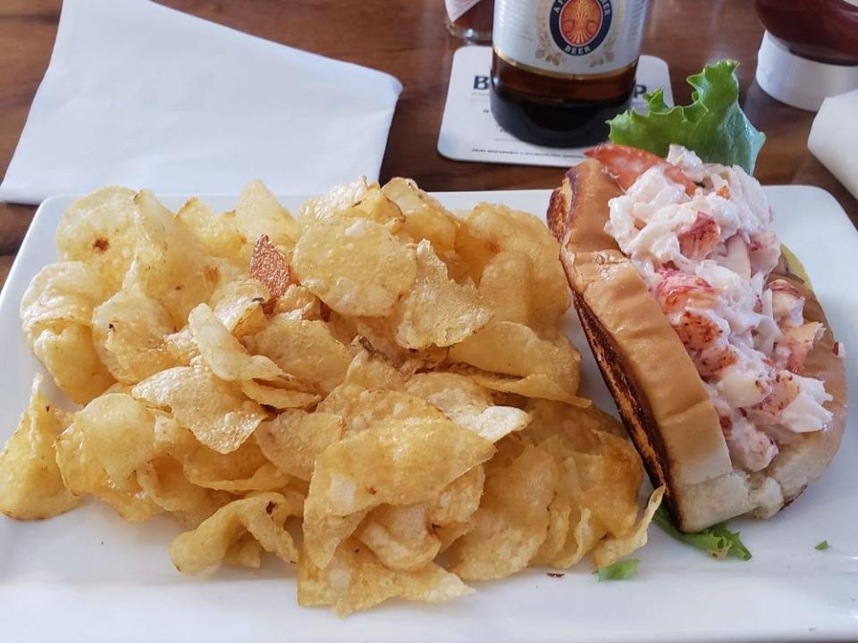 A lobster roll and chips at Tap & Barrel.