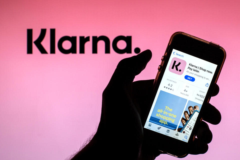 SPAIN - 2021/05/21: In this photo illustration of a Klarna Bank AB app in in the App Store seen displayed on a smartphone with the Klarna Bank AB logo in the background. (Photo Illustration by Thiago Prudencio/SOPA Images/LightRocket via Getty Images)