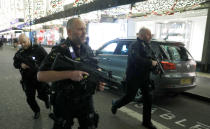 <p>Armed police run along Oxford Street, London, Britain, Nov. 24, 2017. (Photo: Peter Nicholls/Reuters) </p>