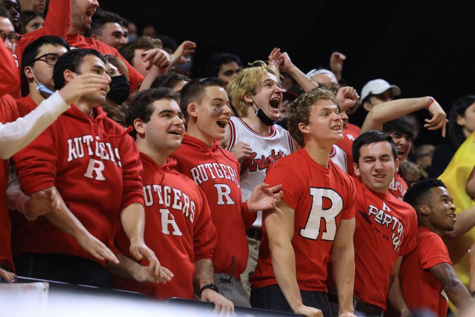 Rutgers Scarlet Knights fans cheer during the second half against the Merrimack Warriors at Jersey Mike's Arena.