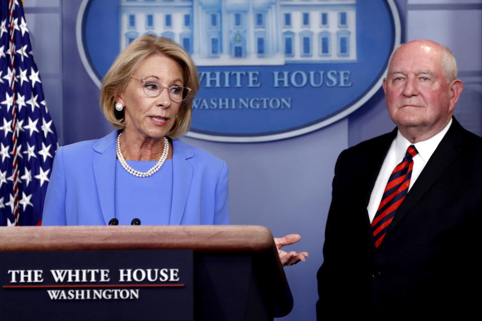 Education Secretary Betsy DeVos speaks about the coronavirus at the White House on March 27, 2020. DeVos imposed new Title IX regulations this month. (Alex Brandon / AP file)