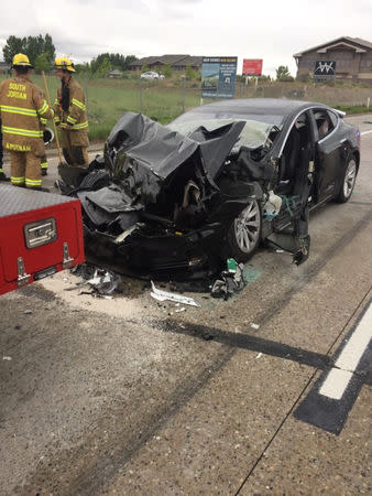 A Tesla Model S is seen after it hit the back of a mechanic truck from the Unified Fire Authority in this traffic collision in South Jordan, Utah, U.S., May 11, 2018. Picture taken May 11, 2018. South Jordan Police Department/Handout via REUTERS