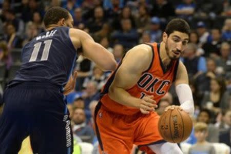 Oklahoma City Thunder center Enes Kanter (11) drives to the basket against Dallas Mavericks center JaVale McGee (11) during the fourth quarter at Chesapeake Energy Arena. Mandatory Credit: Mark D. Smith-USA TODAY Sports