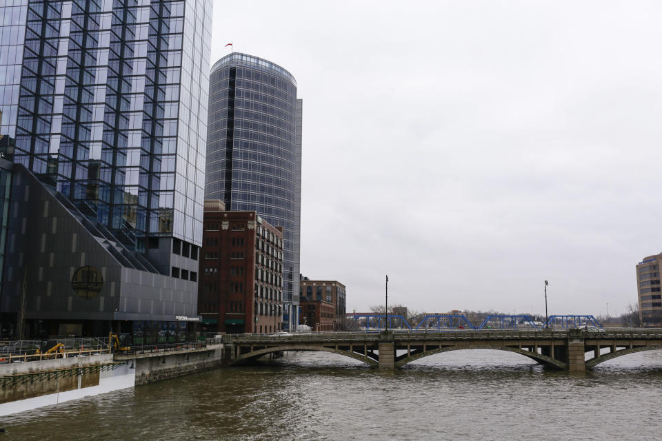 Downtown along the river is seen on Jan. 31, 2024, in Grands Rapids, Mich. Michigan will be a key state in determining the outcome of the upcoming 2024 presidential election, with the economy on the minds of many voters in the state. (AP Photo/Kristen Norman)