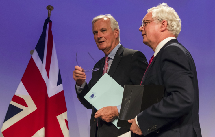 Michel Barnier met his opposite number David Davis last month (Picture: Rex)