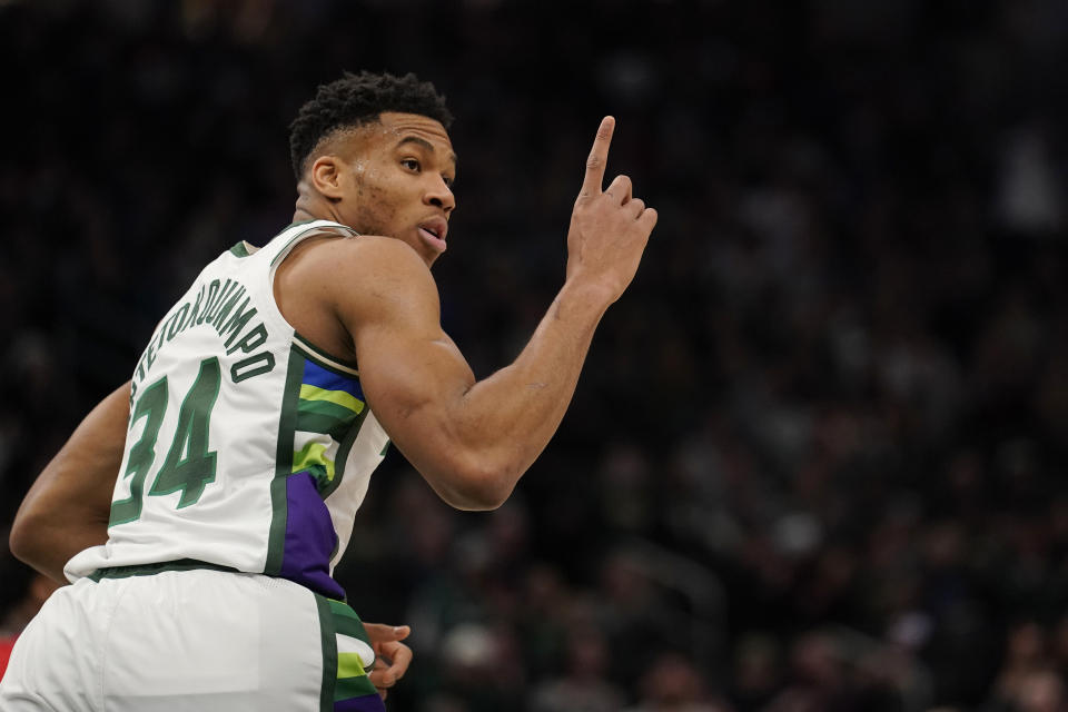 MILWAUKEE, WISCONSIN - NOVEMBER 24: Giannis Antetokounmpo #34 of the Milwaukee Bucks celebrates after a play against the Detroit Pistons in the first half at Fiserv Forum on November 24, 2021 in Milwaukee, Wisconsin. NOTE TO USER: User expressly acknowledges and agrees that, by downloading and or using this photograph, user is consenting to the terms and conditions of the Getty Images License Agreement. (Photo by Patrick McDermott/Getty Images)