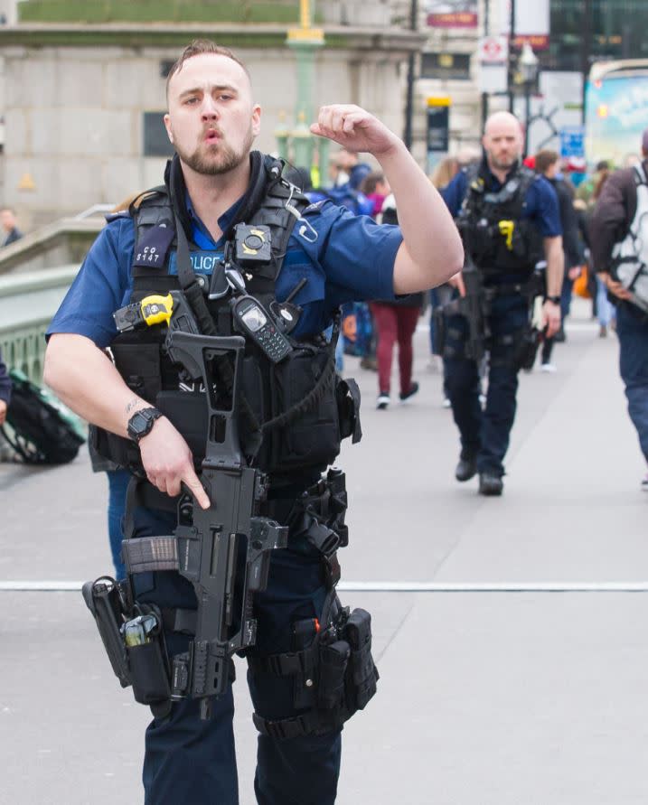 Under threat: Armed police evacuating Westminster Bridge yesterday (REX/Shutterstock)