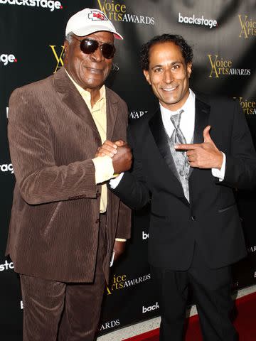 <p>Leon Bennett/Getty</p> John Amos and son K.C. Amos arrive at the 2015 Voice Arts Awards on November 15, 2015 in West Hollywood, California.