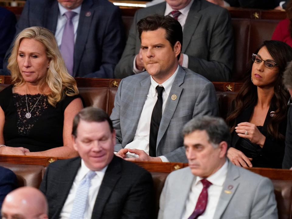 Rep. Marjorie Taylor Greene. R-Ga., left, Rep. Matt Gaetz, R-Fla., center, and Rep. Lauren Boebert, R-Colo., listen during the 15th round of votes in the House chamber as the House enters the fifth day trying to elect a speaker and convene the 118th Congress in Washington, early Saturday, Jan. 7, 2023.