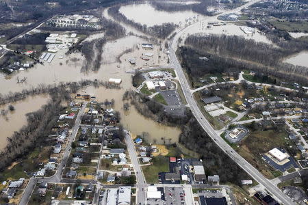 Submerged roads and houses are seen after several days of heavy rain led to flooding, in an aerial view over Union, Missouri, December 29, 2015. REUTERS/Kate Munsch
